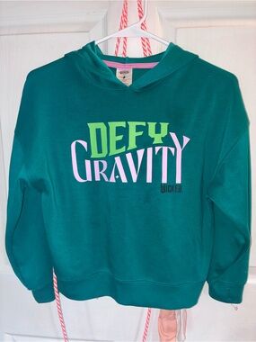 Wicked 'Defy Gravity' Green Graphic Hoodie